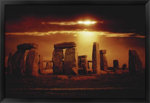 Framed Composite of a Sunset over Stonehenge, Wiltshire, England Print