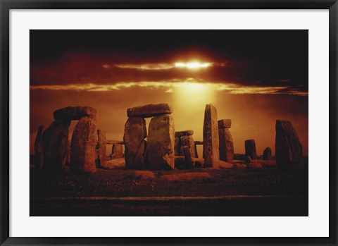 Framed Composite of a Sunset over Stonehenge, Wiltshire, England Print