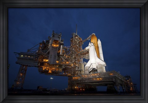 Framed Night view of Space Shuttle Atlantis on the Launch pad at Kennedy Space Center, Florida Print