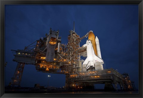 Framed Night view of Space Shuttle Atlantis on the Launch pad at Kennedy Space Center, Florida Print