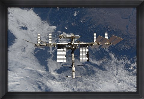 Framed International Space Station Backgropped by a Blue and White Earth Print