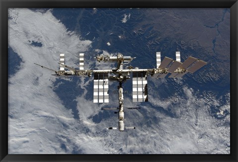 Framed International Space Station Backgropped by a Blue and White Earth Print