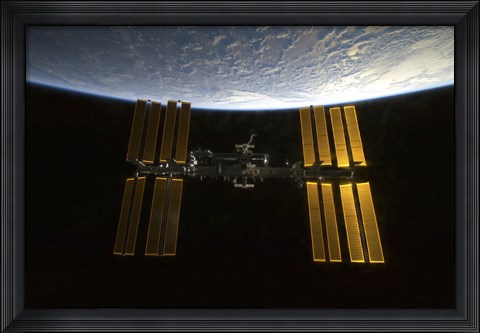 Framed International Space Station  Backdropped against Earth&#39;s Horizon Print
