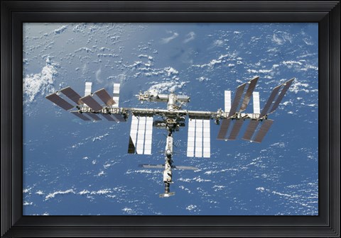 Framed International Space Station Backdropped by a Blue and White Part of Earth Print