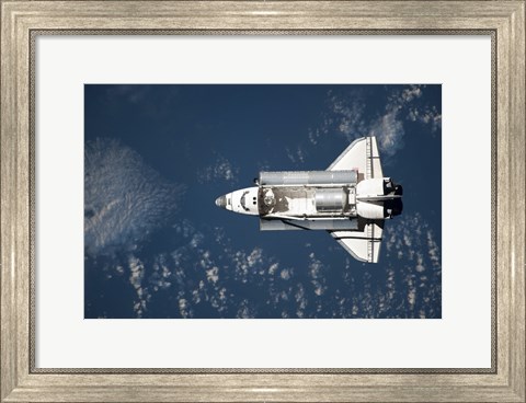 Framed Aerial view of Space Shuttle Discovery over Earth Print
