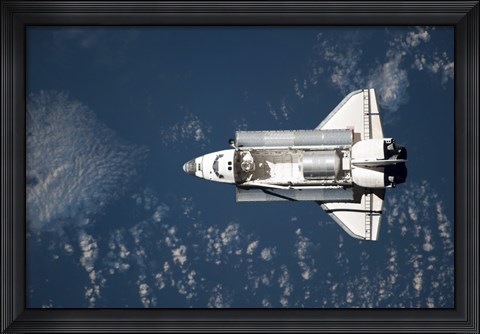 Framed Aerial view of Space Shuttle Discovery over Earth Print