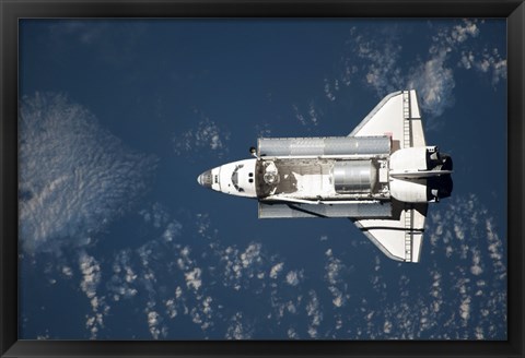 Framed Aerial view of Space Shuttle Discovery over Earth Print