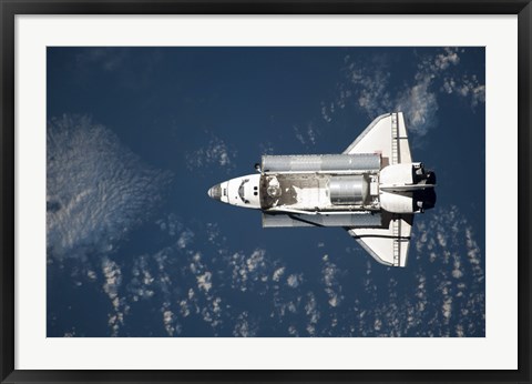 Framed Aerial view of Space Shuttle Discovery over Earth Print