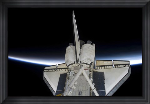 Framed Space Shuttle Discovery Intersecting the Thin line of Earth&#39;s Atmosphere, while Docked with the International Space Station Print