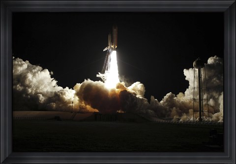 Framed Space shuttle Discovery lifts off from Launch Pad 39A at Kennedy Space Center in Florida, on the STS-131 mission Print