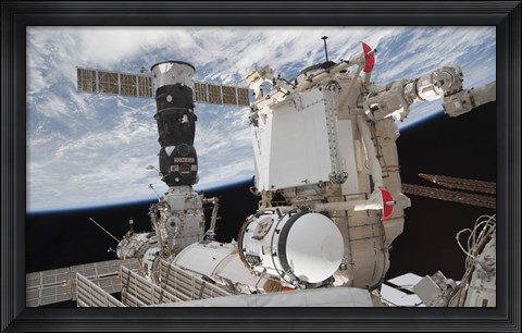 Framed Mini Research Module 1 attached to the International Space Station Print
