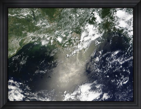 Framed Satellite view of Streaks and Ribbons of Oil Brighten the Reflection of the Sun off the Gulf of Mexico Print