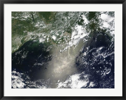 Framed Satellite view of Streaks and Ribbons of Oil Brighten the Reflection of the Sun off the Gulf of Mexico Print