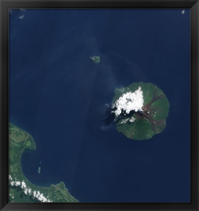 Framed Papua New Guinea&#39;s Manam Volcano releases a thin, Faint Plume over the Bismarch Sea Print