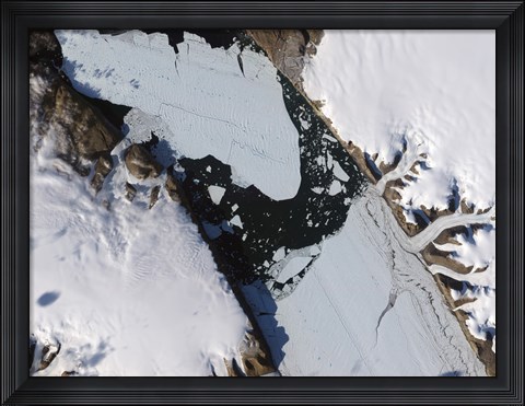 Framed Ice Island that Calved off the Petermann Glacier in Northwestern Greenland Migrates Down the fjord Print