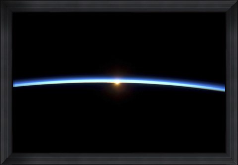 Framed Thin line of Earth&#39;s Atmosphere and the Setting Sun Print