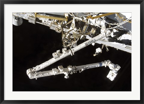 Framed Canadian-Built Space Station Remote Manipulator System (Canadarm2), during Undocking AWctivities Print