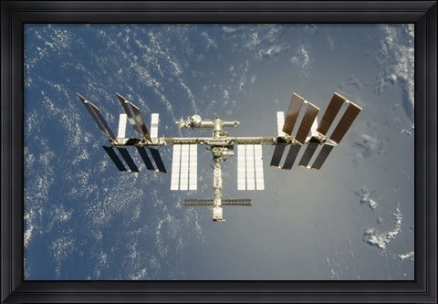 Framed International Space Station Backdropped against Earth Print
