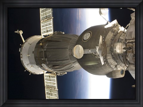 Framed Soyuz spacecraft backdropped by Earth Print