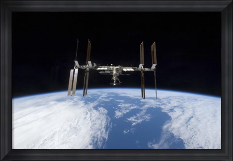 Framed International Space Station backdropped by Earth&#39;s Horizon Print