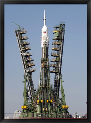 Framed Launch Scaffolding is Raised into place around the Soyuz Rocket Print