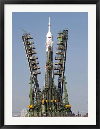 Framed Launch Scaffolding is Raised into place around the Soyuz Rocket Print