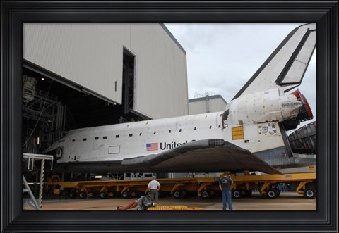Framed Space Shuttle Atlantis Rolls out of Orbiter Processing Facility 1 at Kennedy Space Center Print