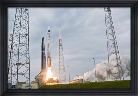 Framed Fire and Smoke Signal the Liftoff of the Atlas V/Centaur Launch Vehicle Print