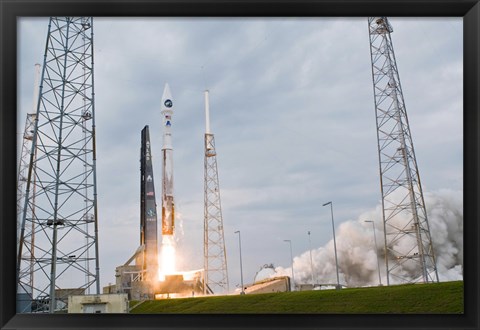 Framed Fire and Smoke Signal the Liftoff of the Atlas V/Centaur Launch Vehicle Print