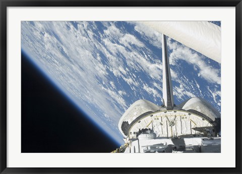 Framed Partial view of Space Shuttle Endeavour Backdropped against Earth Print