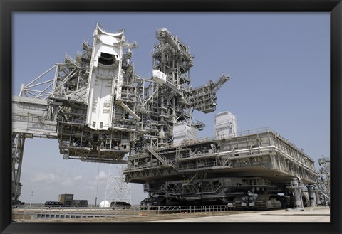 Framed mobile Launcher Platform is being moved via the Crawler-Transporter Underneath Print