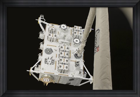 Framed Japanese Experiment Module Exposed Facility in the Grasp of the Shuttle&#39;s Remote Manipulator System Arm Print