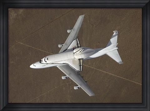 Framed overhead view of Atlantis Atop a Modified 747 Aircraft Print