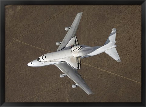 Framed overhead view of Atlantis Atop a Modified 747 Aircraft Print