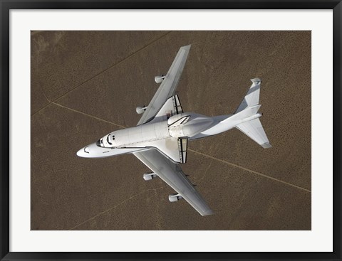 Framed overhead view of Atlantis Atop a Modified 747 Aircraft Print