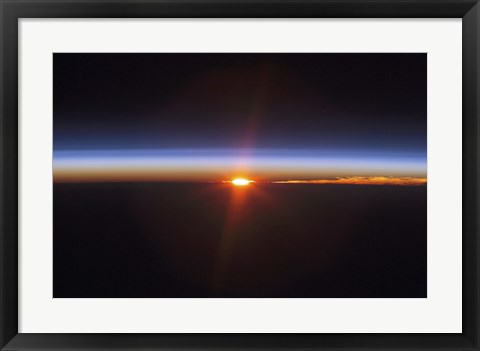 Framed Layers of Earth&#39;s atmosphere, brightly colored as the sun sets over South America Print