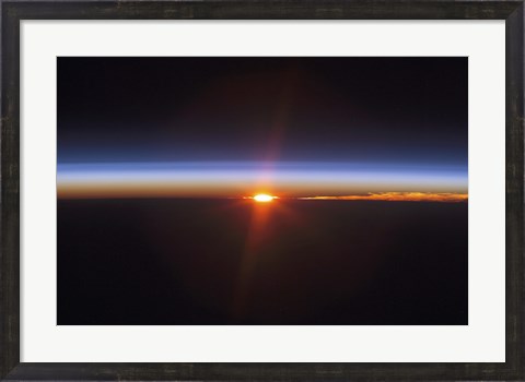 Framed Layers of Earth&#39;s atmosphere, brightly colored as the sun sets over South America Print