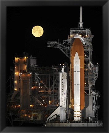 Framed Nearly full Moon Sets as Space Shuttle Discovery Sits Atop the Launch Pad Print