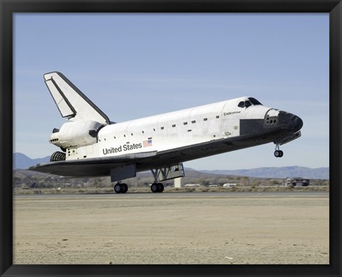 Framed Space Shuttle Endeavour&#39;s Main Landing Gear Touches Down on the Runway Print