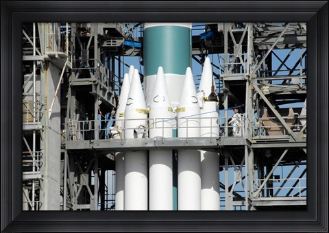 Framed Solid Rocket Boosters are Attached to the Delta II Rocket in the Mobile Service Tower Print