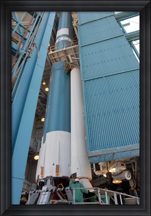 Framed Second Solid Rocket Motor is Moved into Place Alongside the Delta II First Stage Print