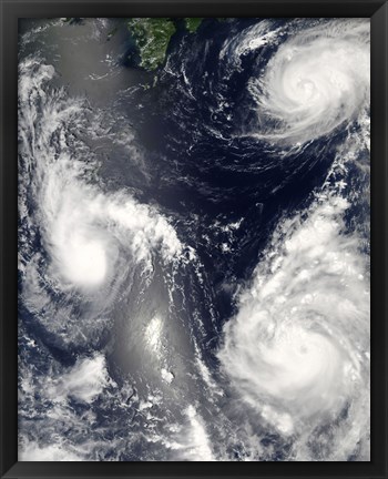 Framed Three different Typhoons Spinning over the Western Pacific Ocean Print