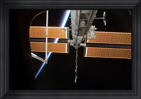 Framed International Space Station Backdropped by the Airglow Above Earth's Horizon Print