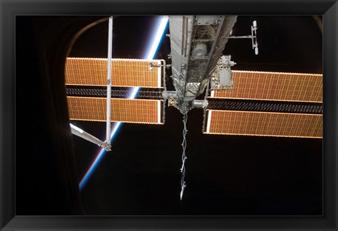 Framed International Space Station Backdropped by the Airglow Above Earth&#39;s Horizon Print