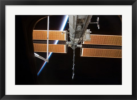 Framed International Space Station Backdropped by the Airglow Above Earth&#39;s Horizon Print