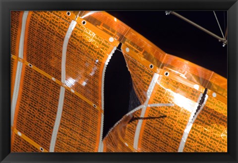 Framed Close-up of a Tear in Solar Array Material on the International Space Station Print