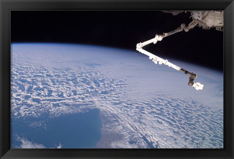 Framed Robotic Canadarm2 above Earth Print