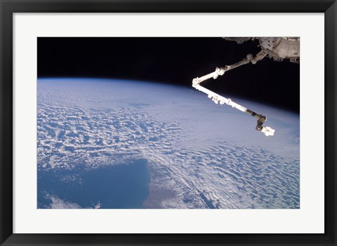 Framed Robotic Canadarm2 above Earth Print