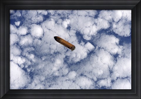Framed Space Shuttles External Fuel Tank Falls Toward Earths Atmosphere Print