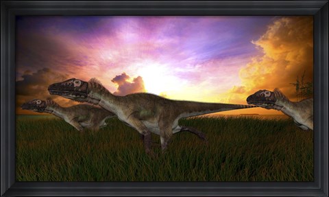 Framed Three Utahraptors Running at Sunset Print